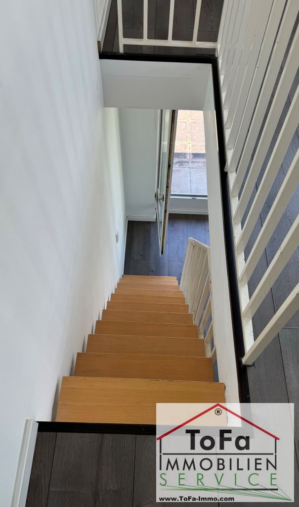 Raumtreppe Dachgeschosswohnung Mainz